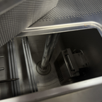 Stainless steel spray arm system inside the commercial conveyor dishwasher